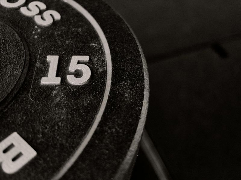 Detailed view of gym weights and training equipment